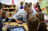 President Barack Obama visits a pre-kindergarten classroom at the College Heights Early Childhood Learning Center in Decatur, Georgia, February 14, 2013. 