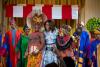 First Lady Michelle Obama joins the cast of Disney's "The Lion King" onstage after their performance at the Kids' State Dinner in the East Room of the White House, July 18, 2014. 