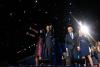 President Barack Obama, First Lady Michelle Obama, daughters Sasha and Malia, Vice President Joe Biden, Dr. Jill Biden, and the Biden family wave to the crowd as confetti rains down following the President's election night remarks at McCormick Place in Ch